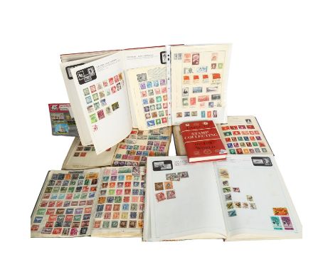 Various postage stamp albums and a guidebook 