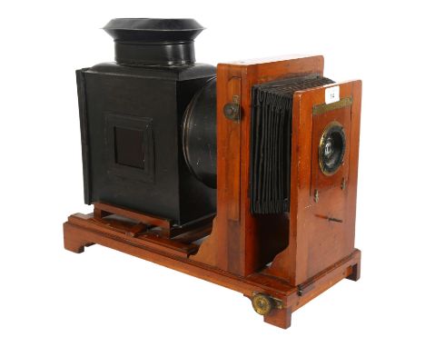 An Antique magic lantern, with sliding projector and bellows, mahogany-mounted, fitted with electric bulb mechanism, base L49