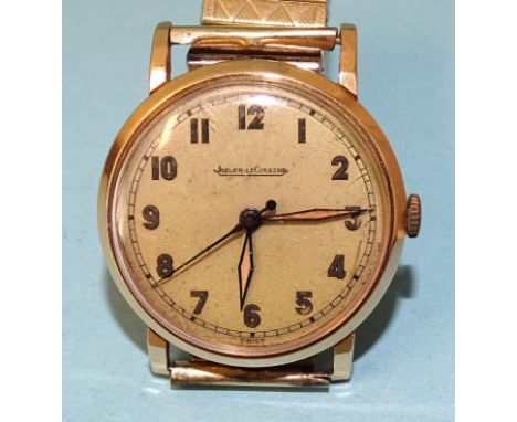 Jaeger LeCoultre, a gentleman's gold wristwatch c1930's, the gilt dial with Arabic numerals and centre seconds, the signed mo