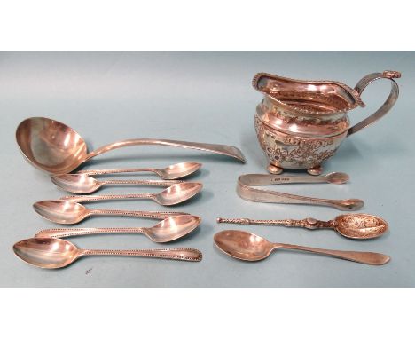 A George IV silver sauce ladle, maker TWJH, London 1820, a Victorian embossed silver jug, Birmingham 1893, a set of six silve