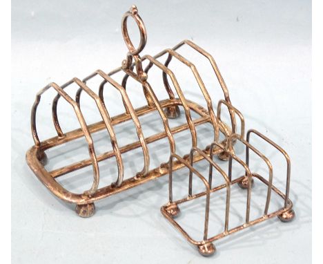 A silver six-division toast rack by Henry Wilkinson &amp; Co, London 1894 and a small four-division wire toast rack raised on