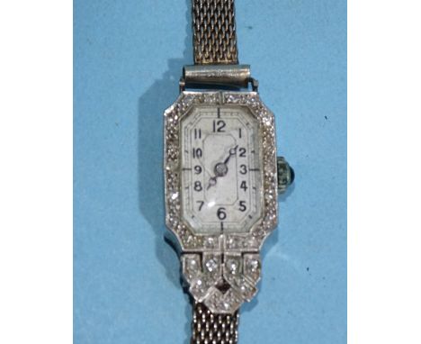 A lady's Art Deco diamond-set manual wrist watch, the platinum octagonal case set twenty-five 8/8-cut diamond points, (a/f, o