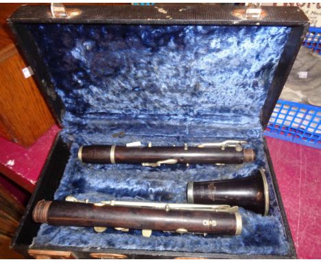 An old clarinet marked for E.J. Albert, Brussels contained in original case - mouthpiece missing