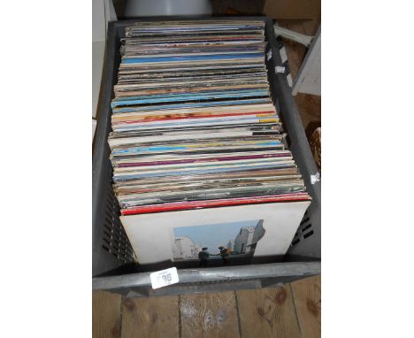 A crate containing a large quantity of LP records, including Showaddywaddy, Adam &amp; The Ants, Michael Jackson, etc.