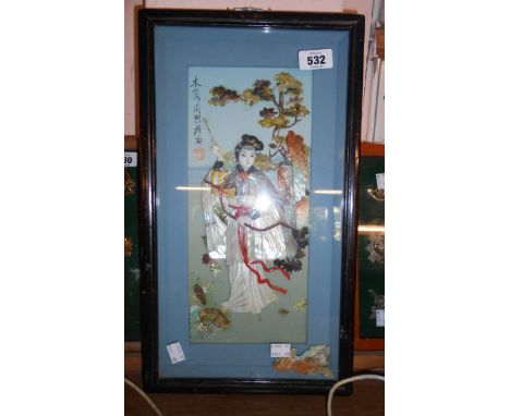A box frame containing a Japanese 3D picture depicting a female archer in coloured plastic and mother-of-pearl