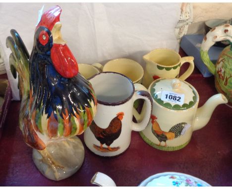 A large Philip Laureston Babbacombe pottery cockerel figurine - sold with a quantity of cockerel decorated ceramics comprisin