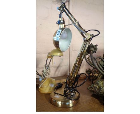 A modern anglepoise lamp with brassed finish - sold with a small adjustable similar