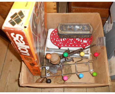A box containing a quantity of assorted collectable items comprising Tower scale, cast iron trivet, hot plate old marmalade c
