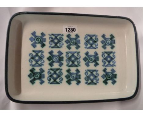 A 1960's Troika St. Ives serving dish of rounded oblong form decorated with hand painted geometric designs with tin glaze - p