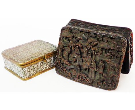 A late 19th Century Chinese Canton pressed tortoiseshell snuff box with curved back and profuse highly detailed carved decora