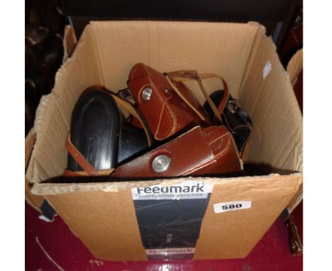 A box containing a quantity of vintage cameras including Zeiss, Zorki, Yashica, etc.