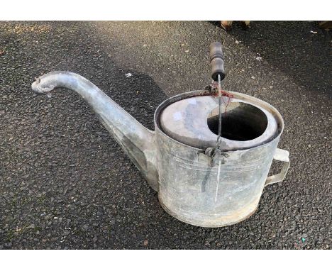 A vintage galvanised watering can