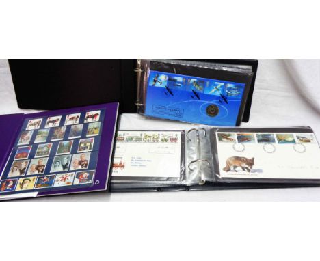 A Royal Mail Special Stamps 1997 illustrated album with still-sealed mint stamp contents - sold with two ring bound albums co