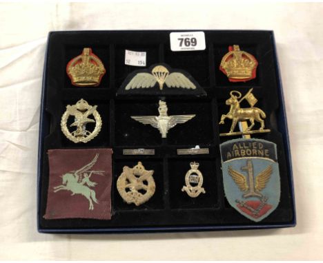 WWII First Airborne and other military cap badges and patches