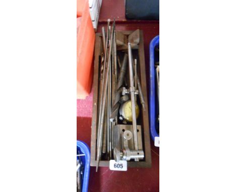 A wooden tray containing a quantity of drill bits, tools, etc.