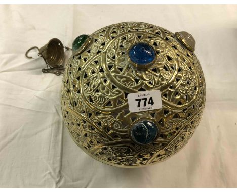 An old Eastern pierced brass hanging lantern of globe form with inset glass cabochon - later conversion to electricity