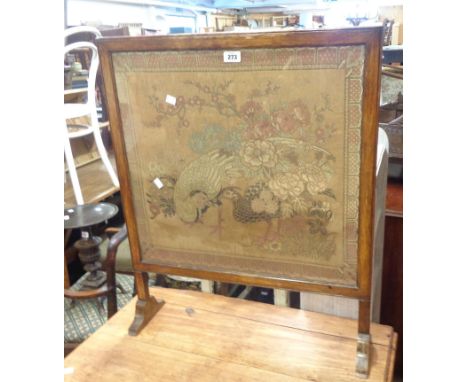 A 63cm antique stained oak framed fire screen, set with a Japanese late Meiji period embroidered textile panel under glass, d