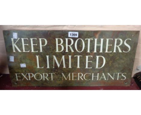 A bronze trade name plaque with white enamel lettering for 'Keep Brothers Ltd' Export merchants - enamel lettering damaged an