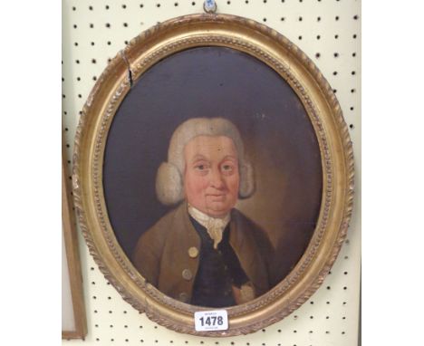 An antique oval gilt framed oil on panel portrait of an 18th Century gentleman - with handwritten details verso - 29cm X 24cm
