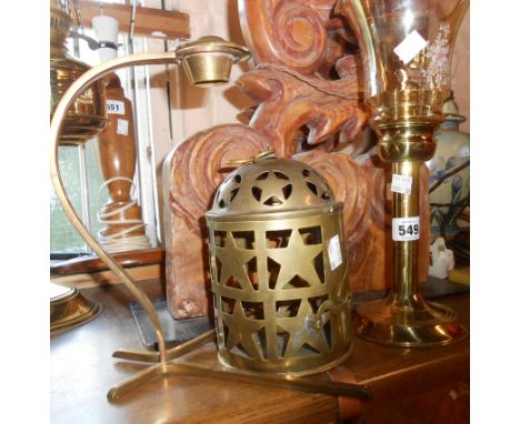A modern brass spring loaded candle lamp with glass shade, a similar hanging cage style brass lantern - sold with another bra