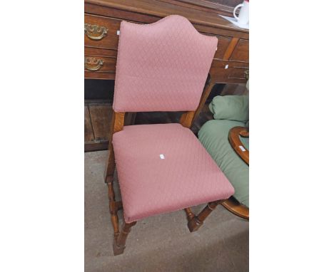 A set of ten Brights of Nettlebed polished oak framed panel back dining chairs with old rose repeat pattern tapestry upholste