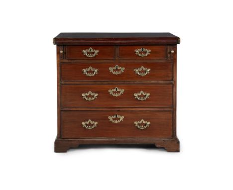 A GEORGE III MAHOGANY FOLD TOP BATCHELORS CHEST C.1780   the moulded rectangular top with baize lined interior above an arran