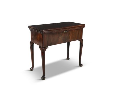 A FINE GEORGE I RED WALNUT COMPACT  DESK,  with gate-leg action, the rectangular triple hinged top opening to an inset leathe