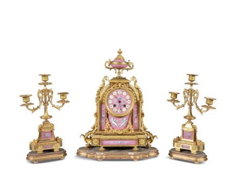 A 19TH CENTURY FRENCH ORMOLU THREE-PIECE CLOCK GARNITURE,   decorated with inset hand painted Sevres panels with grisaille pu