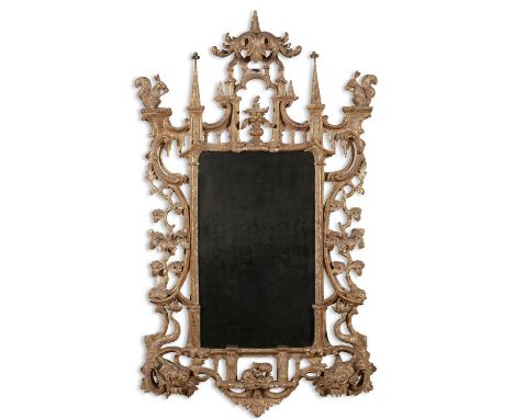 AN IMPORTANT IRISH CARVED ROCOCO GILTWOOD MIRROR IN THE CHINOISERIE TASTE, C.1760  the rectangular plate within an architectu