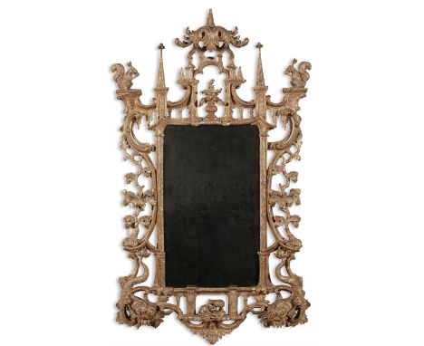 AN IMPORTANT IRISH CARVED ROCOCO GILTWOOD MIRROR IN THE CHINOISERIE TASTE, C.1760  the rectangular plate within an architectu