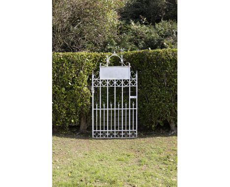 A 19TH CENTURY WROUGHT IRON SINGLE GARDEN GATE   with arched top. 173cm x 87cm