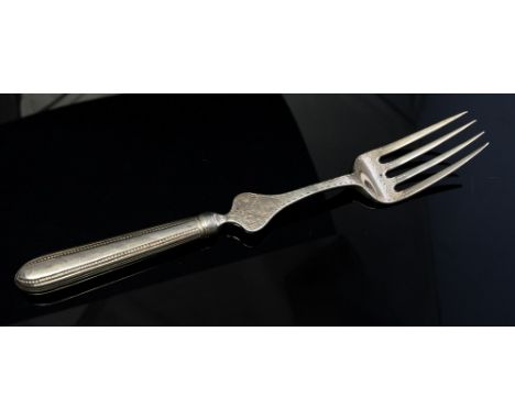 A George III silver bright-cut engraved serving fork, engraved with a crest, maker's mark possibly that of Robert Hennell, Lo