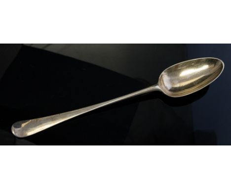 A George III Old English Pattern serving spoon, the reverse handle engraved with a crest, Elizabeth Tookey, London, 1768 (1) 