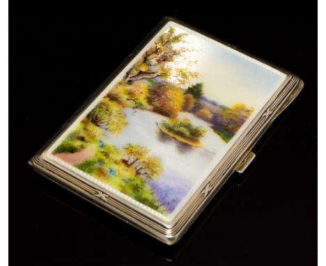 A George V silver and enamel cigarette case, engine turned base, the cover painted with a river scene, gilt interior, F B Rey