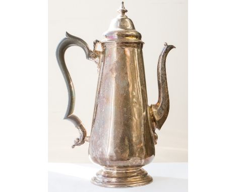 A George V silver coffee pot, plain tapering cylindrical on raised circular foot, the hinged dome cover with pagoda style fin