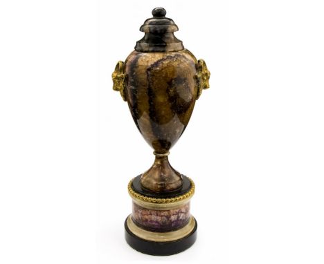 A 19th Century Derbyshire Blue John covered urn in the manner of Matthew Boulton, circular turned finial, baluster body with 