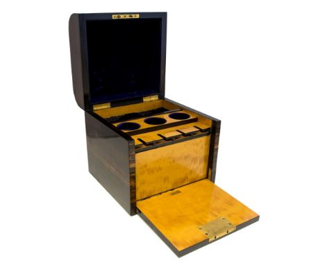 A Victorian gentleman's coromandel humidor/decanter box, circa 1870, the domed top enclosing satinwood and velvet lined inter