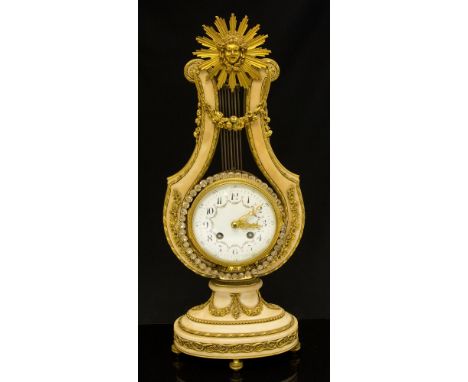 A late 19th Century French lyre-shaped bracket clock, alabaster with ormolu mounts, 10cm white enamel dial with arabic numera