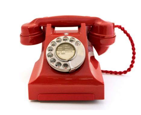 A circa 1950s Chinese red 300 series desk telephone, the handset with ITI marking (Indian Telephone Industries), alphabetical