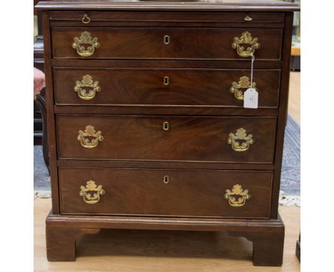 A George III mahogany chest of drawers, circa 1780, comprising brushing slide over four long graduated drawers, raised on bra