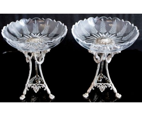 A large glass comport with silver plated base and mounts together with a matching smaller comport and a pair of similar sweet