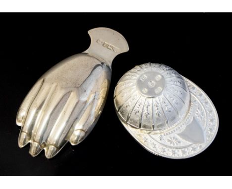 An Elizabeth II silver caddy spoon in the shape of a jockey's cap, Sheffield Diamond Jubilee Mark 2012 and a further silver h