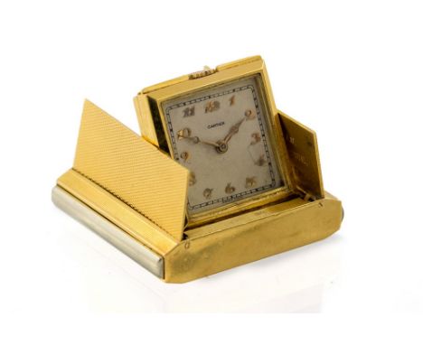 Cartier, a Cartier Art Deco 18ct gold travel timepiece, engine turned spring action opening and folding case, inscription for