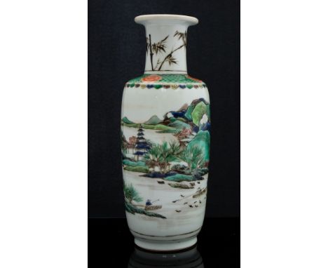 A Chinese famille verte small rouleau vase, Kangxi period, painted with a scene of fishermen with their cranes in a broad riv