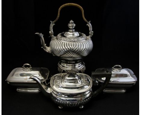 A collection of Georgian style silver-plate including: A pair of shaped oblong sauce tureens and covers, the covers engraved 