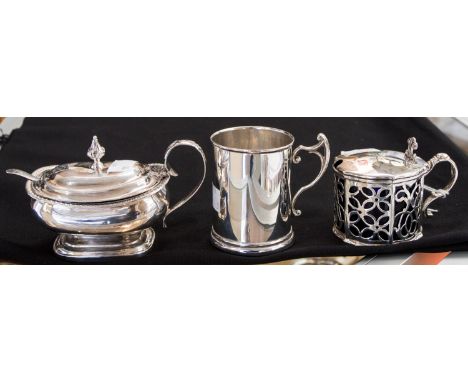 A Victorian shaped circular silver mustard pot and hinged cover, pierced sides on wavy foot, the hinged cover with open work 