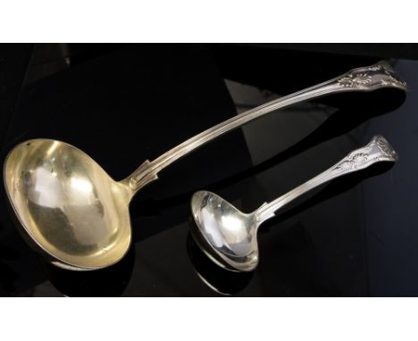 A George V silver King's pattern soup ladle and a matching Sauce ladle, James Dixon & Sons, Sheffield, 1934, (2)
