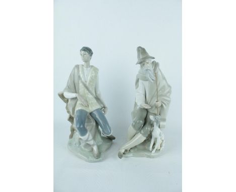 Lladro 'New Shepherd' 01004577 and 'Beggar' 01001094. Condition - Unboxed Good Overall, Shepherd missing crook 