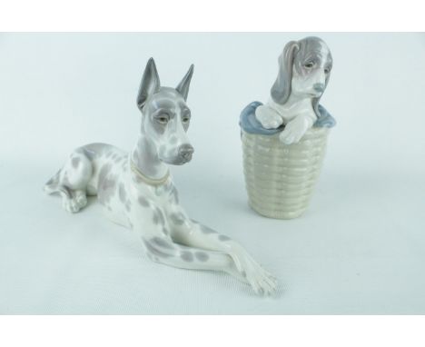 Lladro 'Great Dane' 01001068 and 'Dog in Basket' 01001128. Condition - Boxed Good Overall 