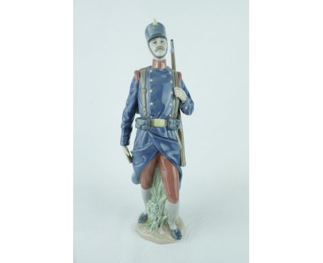 Lladro 'Spanish Soldier', Sculptor: Salvador Furió. Model 01005255, Introduced in 1984 and Retired in 1987. 30cm in height. C
